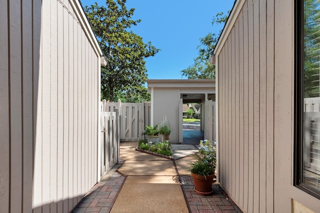 view of side of property with a patio area