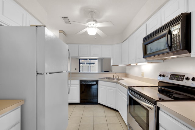 kitchen featuring ceiling fan, white cabinetry, black appliances, sink, and light tile floors