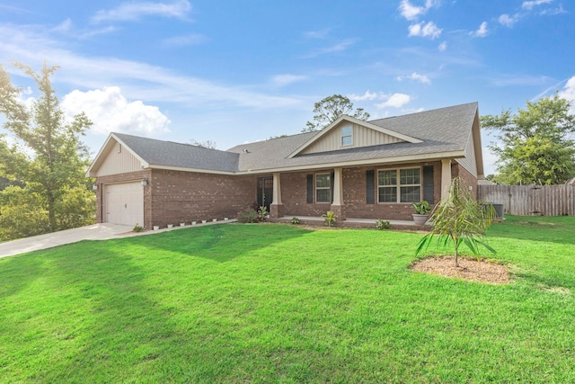 view of front facade featuring a garage and a front lawn