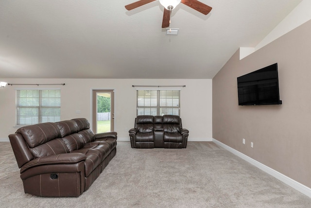 living room with light carpet, ceiling fan, and lofted ceiling