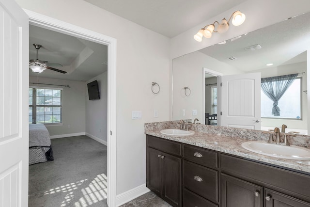 bathroom with vanity and ceiling fan