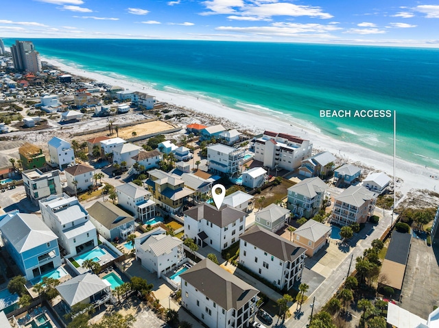 aerial view featuring a water view and a view of the beach