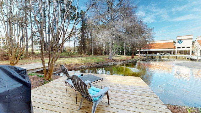 view of dock with a water view