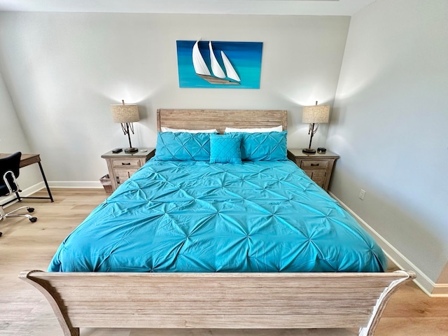 bedroom featuring light wood-type flooring