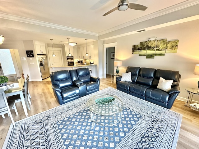 5377 Pine Ridge Ln Unit 5377, Miramar Beach, FL 32550 - living room with a ceiling fan, light wood-style flooring, crown molding, and baseboards