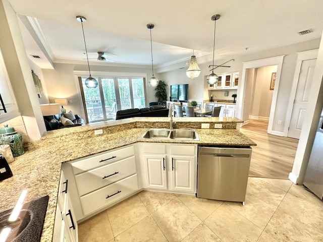 kitchen with stainless steel dishwasher, white cabinetry, sink, and crown molding