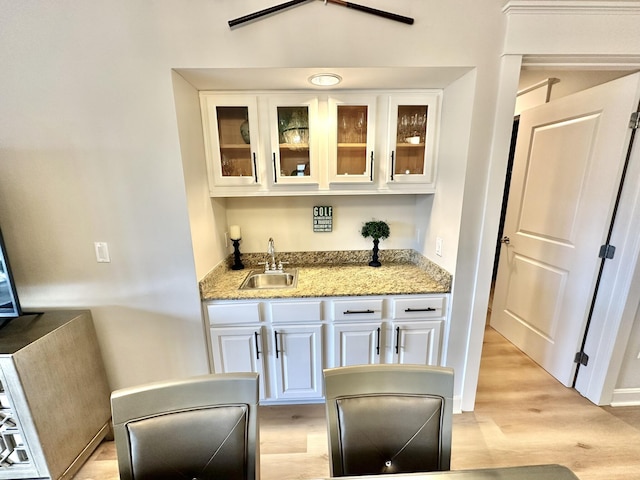 5377 Pine Ridge Ln Unit 5377, Miramar Beach, FL 32550 - indoor wet bar with light wood-style flooring