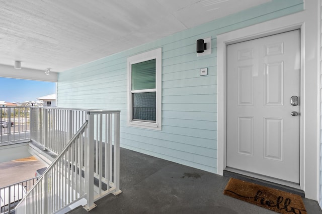 entrance to property with covered porch