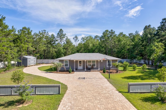 521 W Juniper Ave, Defuniak Springs, FL 32433 - single story home with covered porch and decorative driveway