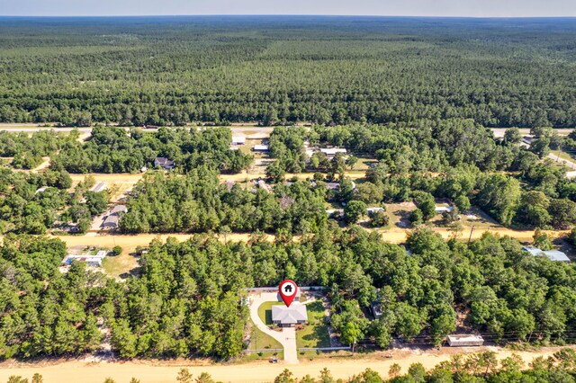 521 W Juniper Ave, Defuniak Springs, FL 32433 - aerial view of a heavily wooded area