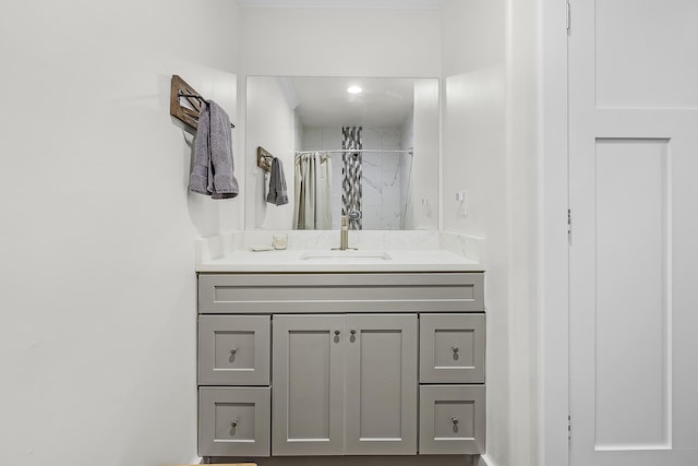 bathroom with vanity and curtained shower