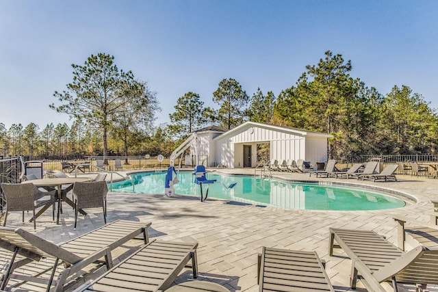 view of swimming pool featuring a patio