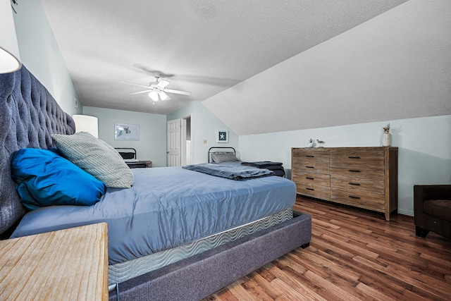 bedroom featuring ceiling fan, a textured ceiling, lofted ceiling, and wood-type flooring