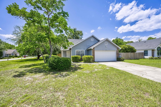 ranch-style house featuring a garage and a front lawn