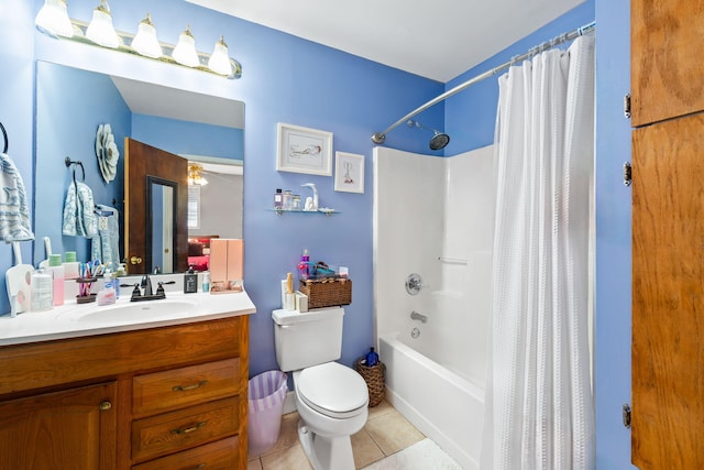 full bathroom featuring shower / bathtub combination with curtain, vanity, toilet, and tile floors