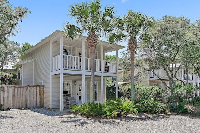 view of front of house with a balcony