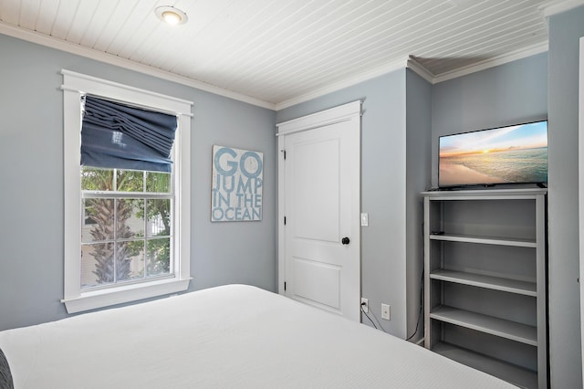 bedroom with wooden ceiling and crown molding