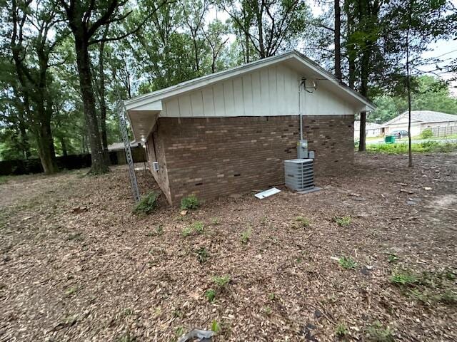 view of home's exterior featuring central air condition unit