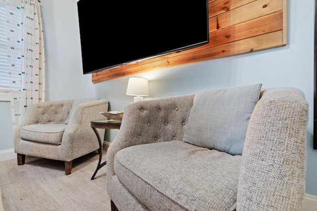 sitting room featuring hardwood / wood-style floors