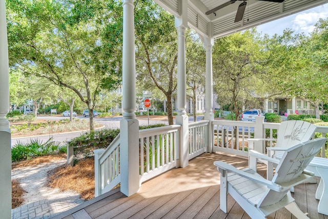 wooden deck with ceiling fan and a porch