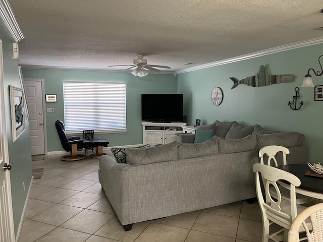 tiled living room with ceiling fan, crown molding, and a textured ceiling