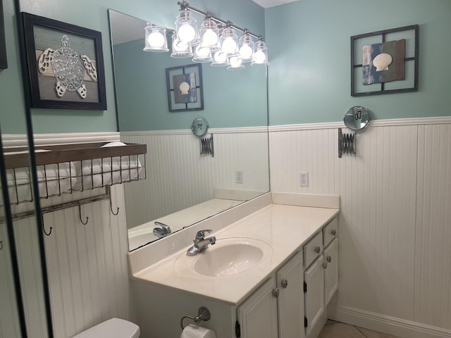 bathroom with vanity and tile patterned floors