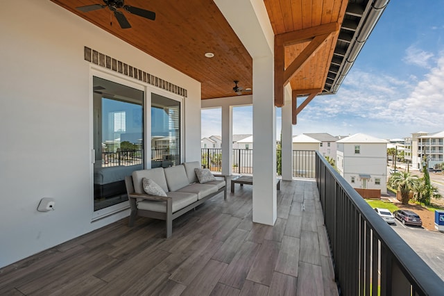 balcony with ceiling fan and an outdoor hangout area