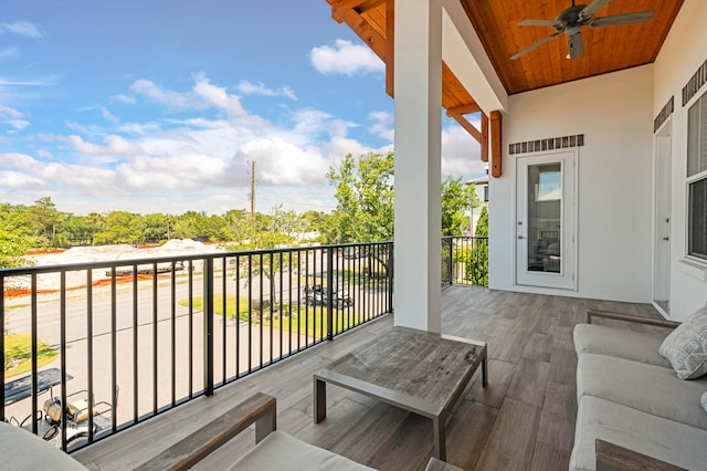 balcony featuring ceiling fan