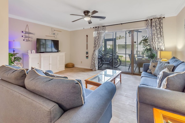 living room featuring ceiling fan and ornamental molding