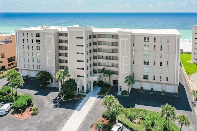 view of building exterior with a water view