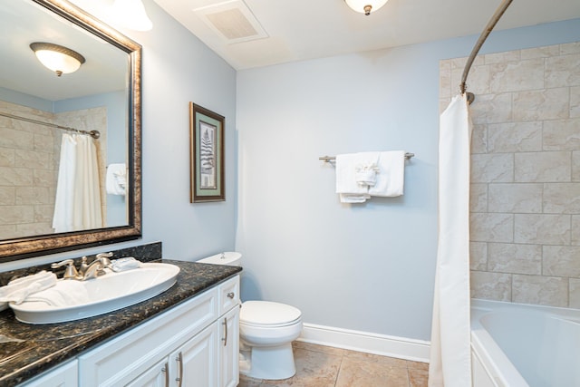 full bathroom featuring vanity, shower / bath combo, and toilet