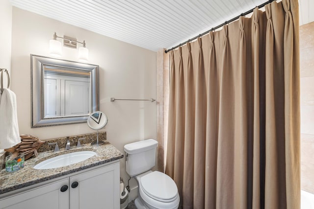 bathroom with oversized vanity and toilet