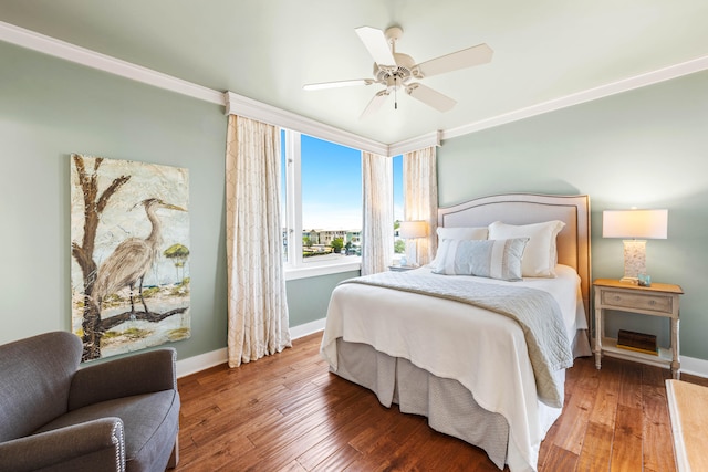 bedroom featuring ceiling fan and hardwood / wood-style floors