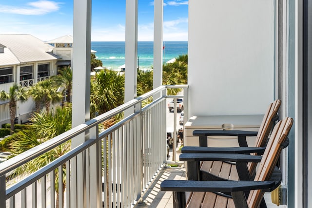 balcony featuring a water view