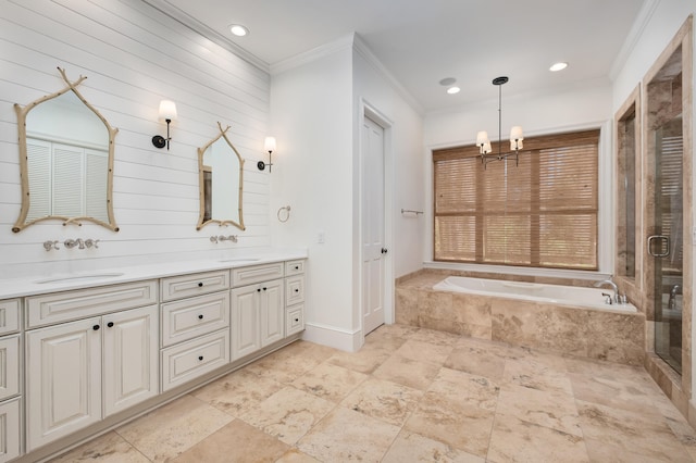 bathroom featuring tile flooring, crown molding, double sink, vanity with extensive cabinet space, and separate shower and tub