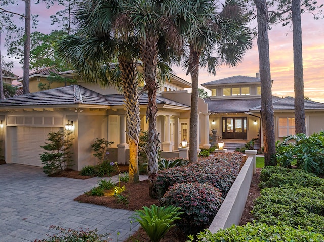 view of front of property featuring a garage