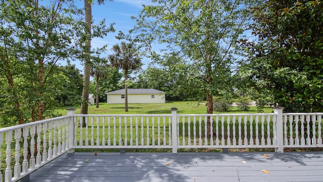 wooden deck with a yard