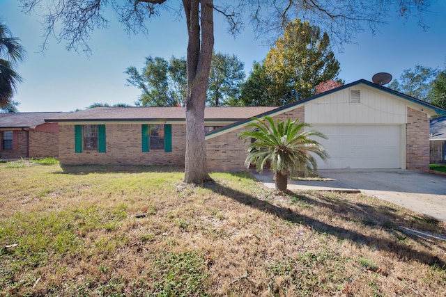 view of front of property with a garage and a front yard