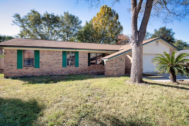 single story home with a garage and a front yard