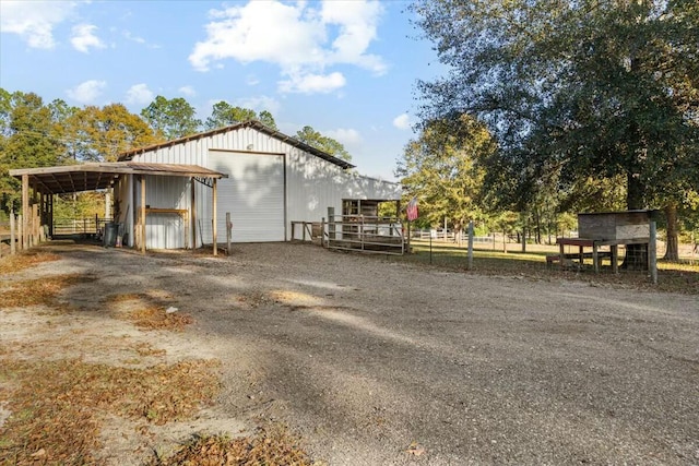 view of property exterior featuring an outdoor structure