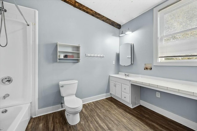 full bathroom featuring toilet, vanity, lofted ceiling with beams, and hardwood / wood-style flooring