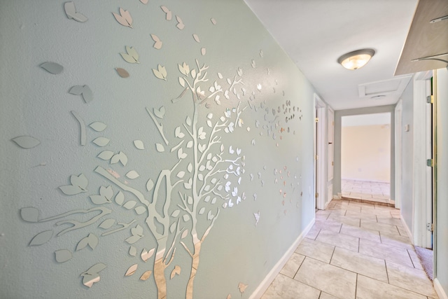 corridor with light tile patterned flooring