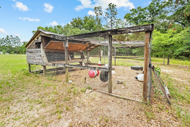 view of yard with an outdoor structure