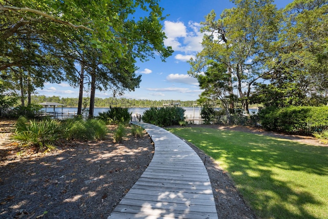 view of nearby features with a lawn and a water view