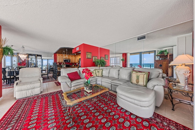 tiled living room with a textured ceiling