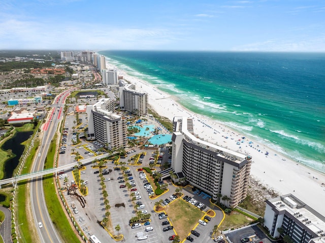 aerial view with a beach view and a water view