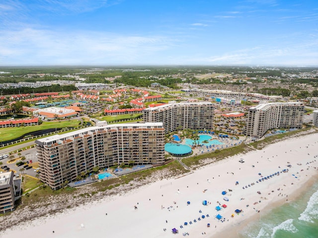 bird's eye view with a view of the beach and a water view