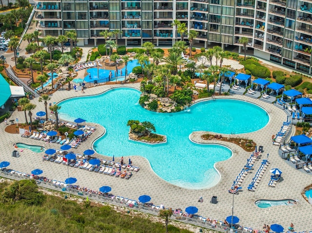 view of swimming pool featuring a patio