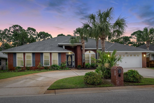 view of front of house with a garage