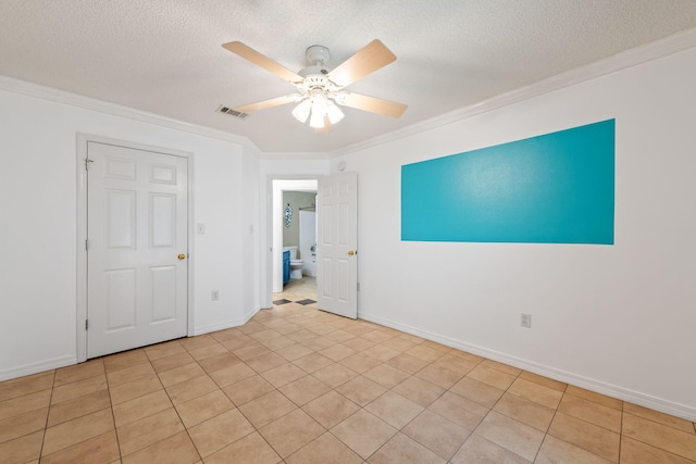 unfurnished bedroom featuring a textured ceiling, ceiling fan, light tile floors, and crown molding